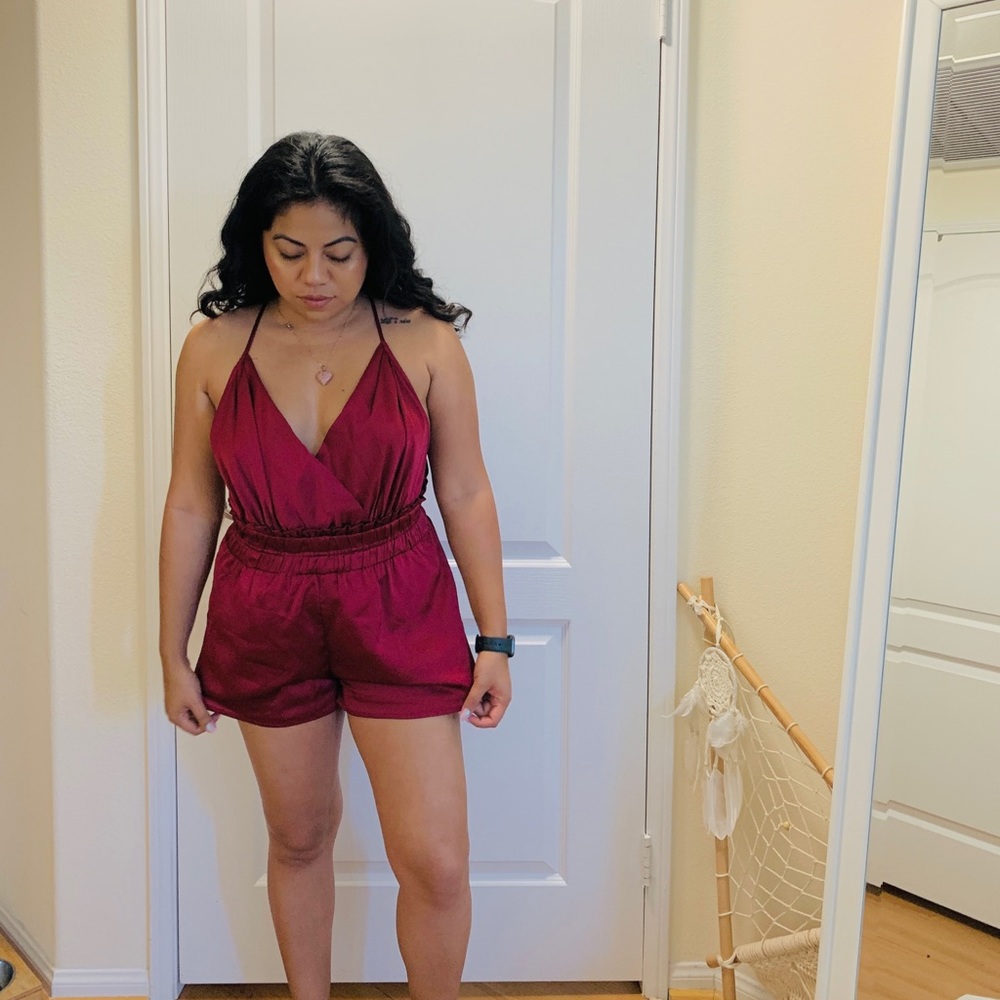 Maroon romper.